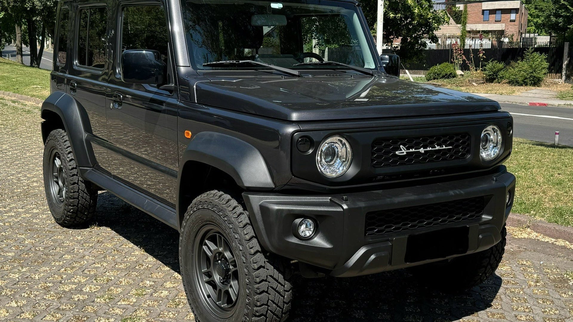 Granite Grey 5-door Suzuki Jimny fitted with various JimnyStyle Accessories