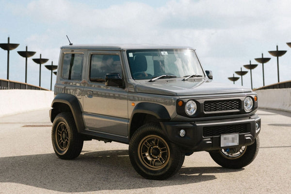 Grey Suzuki Jimny with Matte Bronze ENKEI ALLROAD RPT1 Wheels