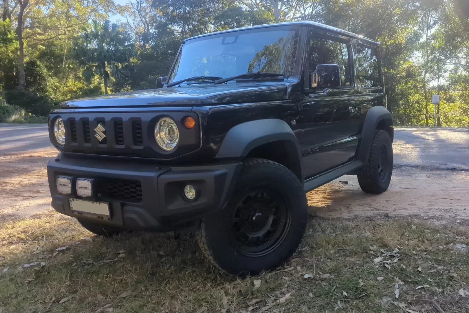 Suzuki Jimny (2018+) fitted with Matte Black High Peak J-01 wheels and Toyo Tyres in a 215/70R16