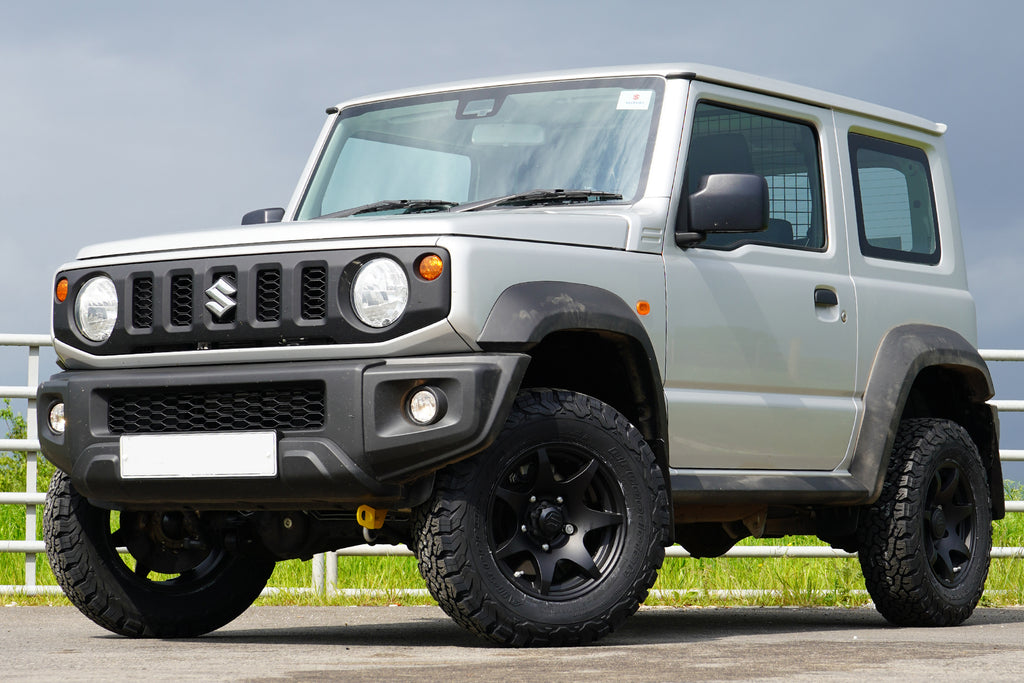 Suzuki Jimny (2018+) with JimnyStyle Suspension Lift Kit, APIO Tow Hooks and HIGH PEAK J-02 wheels.