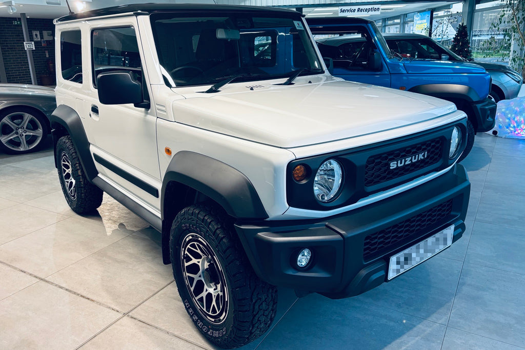 White Suzuki Jimny fitted with Magpie M-01 wheels in Satin Black with Machined Face